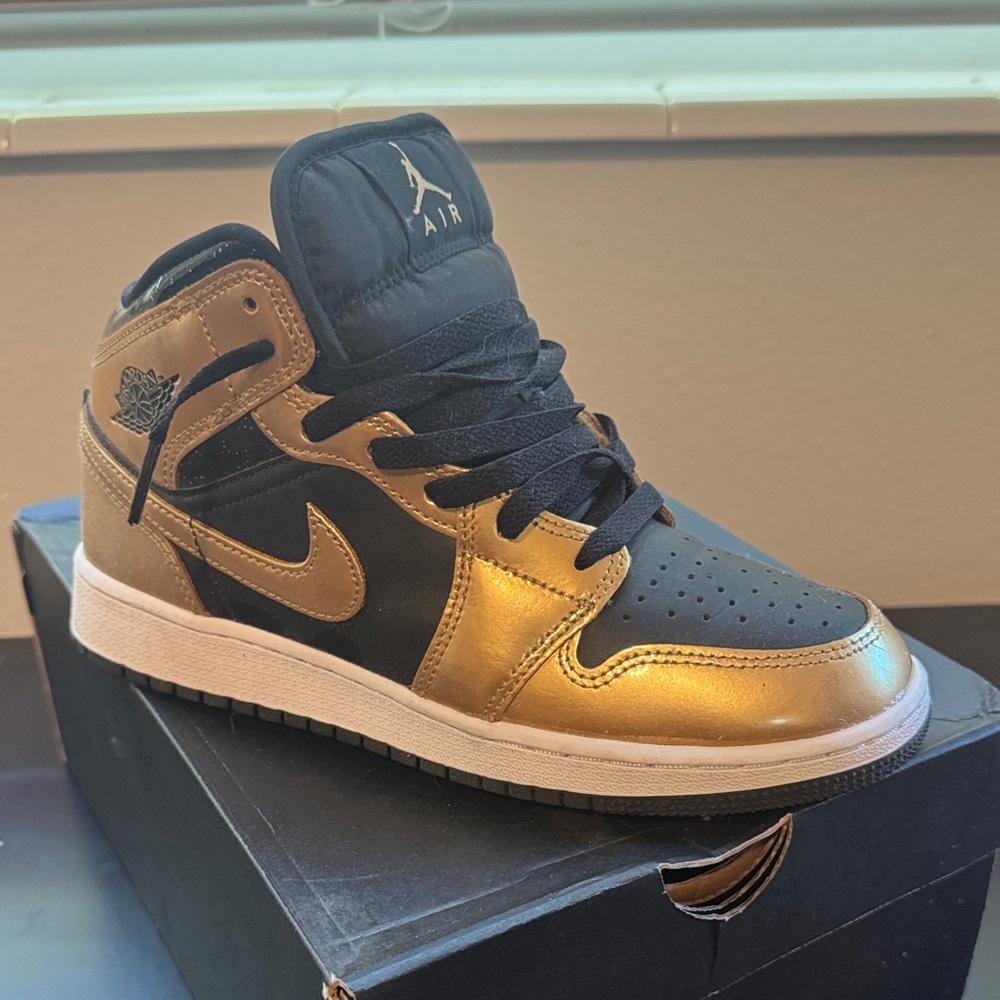 Air Jordan Black and Gold Sneakers